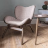 A Conversation Piece Lounge Chair by Umage