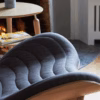 A Conversation Piece Lounge Chair by Umage