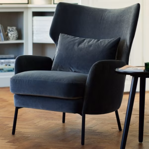 Sits Alex Armchair Upholstered in Fabric and Leather