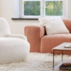 Sits Uma Armchair Upholstered in Fabric or Leather
